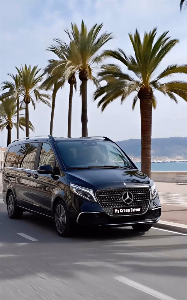 French Riviera destinations by chauffeur: black Mercedes V-Class on the Promenade des Anglais with palm trees and the sea